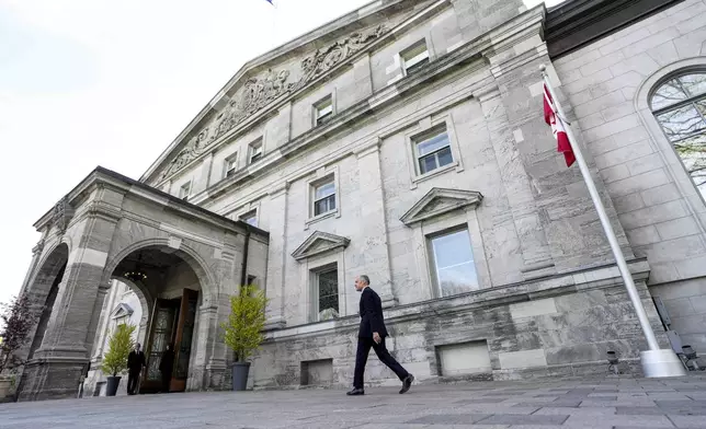 Canadian Prime Minister Mark Carney, arrives for the cabinet swearing-in ceremony at Rideau Hall in Ottawa, Tuesday, May 13, 2025. (Justin Tang/The Canadian Press via AP)