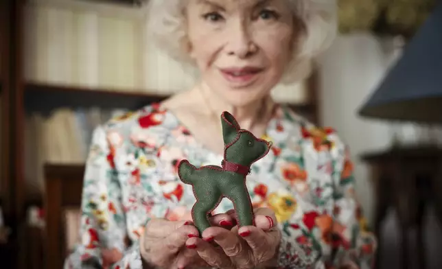 Marie-Pierre Pruvot known as Bambi, one of the first trans women in the world to become a public star, and a pioneer in global LGBTQ+ history, poses during an interview with The Associated Press, in Pantin, outside Paris, Tuesday, May 20, 2025. (AP Photo/Thomas Padilla)