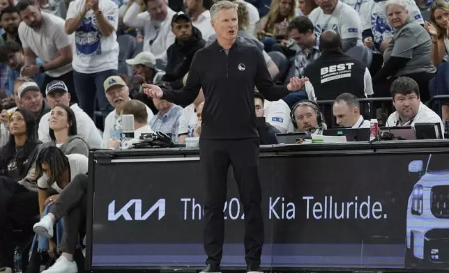 Golden State Warriors head coach Steve Kerr reacts during the second half of Game 2 of an NBA basketball second-round playoff series against the Minnesota Timberwolves, Thursday, May 8, 2025, in Minneapolis. (AP Photo/Abbie Parr)