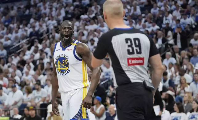 Golden State Warriors forward Draymond Green (23) reacts toward referee Tyler Ford during the second half of Game 2 of an NBA basketball second-round playoff series against the Minnesota Timberwolves, Thursday, May 8, 2025, in Minneapolis. (AP Photo/Abbie Parr)