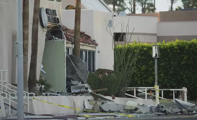 Damage to a building is seen after an explosion in Palm Springs, Calif., on Saturday, May 17, 2025. (AP Photo/Eric Thayer)