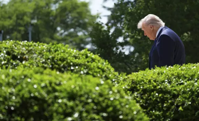 President Donald Trump arrives to speak during a National Day of Prayer event in the Rose Garden of the White House, Thursday, May 1, 2025, in Washington. (AP Photo/Evan Vucci)