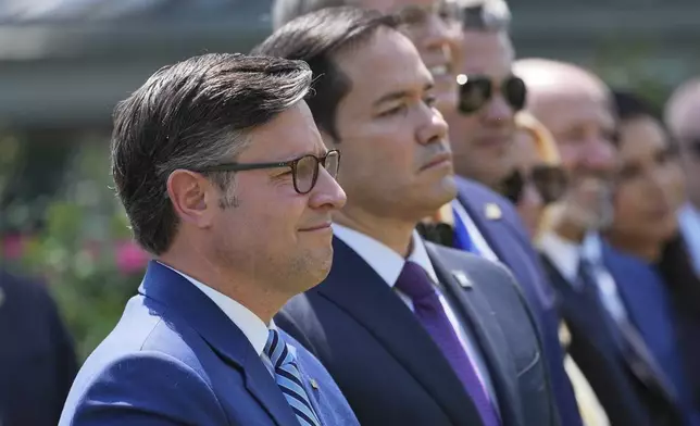 House Speaker Mike Johnson, R-La., from left, Secretary of State Marco Rubio, Treasury Secretary Scott Bessent, Defense Secretary Pete Hegseth, Attorney General Pam Bondi and Commerce Secretary Howard Lutnick listen as President Donald Trump speaks during a National Day of Prayer event in the Rose Garden of the White House, Thursday, May 1, 2025, in Washington. (AP Photo/Evan Vucci)