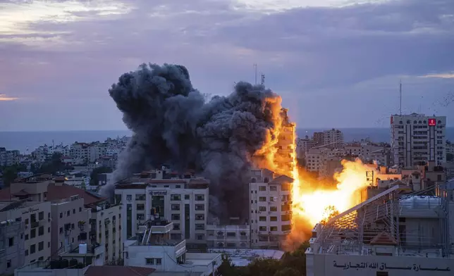 FILE - Fire and smoke rise following an Israeli airstrike in Gaza City, Oct. 7, 2023. (AP Photo/Fatima Shbair, File)