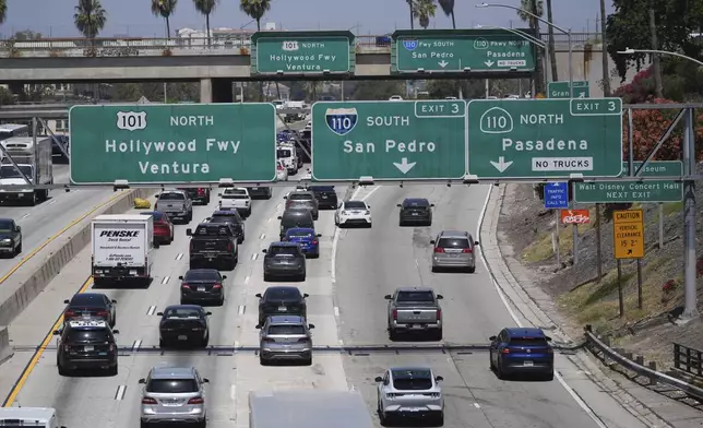 Traffic converges on a freeway Thursday, May 22, 2025, in Los Angeles. (AP Photo/Jae C. Hong)