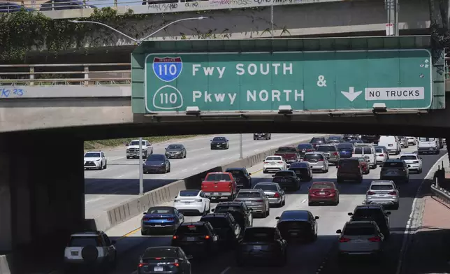 Traffic makes its way along the 110 freeway Thursday, May 22, 2025, in Los Angeles. (AP Photo/Jae C. Hong)