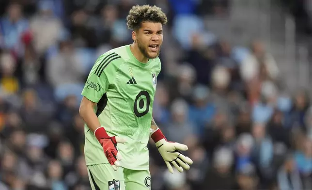 Minnesota United goalkeeper Dayne St. Clair (97) reacts during the first half of an MLS soccer match against St. Louis City, Saturday, May 17, 2025, in St. Paul, Minn. (AP Photo/Abbie Parr)