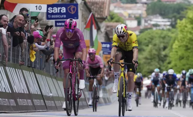 ADDS THE NAME Denmark's Pedersen Mads of Lidl–Trek Team, left, competes during the 13th stage of the Giro d'Italia cycling race from Rovigo to Vicenza, Italy, Friday, May 23, 2025. (Gian Mattia D'Alberto/LaPresse via AP)