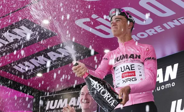 Mexico's Isaac del Toro of Uae Team Emirates celebrates after the 13th stage of the Giro d'Italia cycling race from Rovigo to Vicenza, Italy, Friday, May 23, 2025. (Gian Mattia D'Alberto/LaPresse via AP)