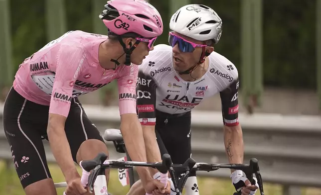 Mexico's Isaac del Toro of Uae Team Emirates, left, and Poland's Majka Rafal of Uae Team Emirates compete during the 13th stage of the Giro d'Italia cycling race from Rovigo to Vicenza, Italy, Friday, May 23, 2025. (Marco Alpozzi/LaPresse via AP)