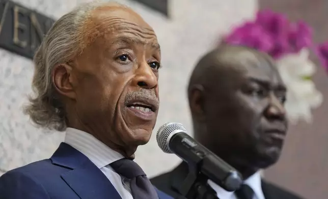 Rev. Al Sharpton, left, speaks with Attorney Ben Crump during a memorial service on the anniversary of George Floyd's death on Sunday, May 25, 2025, in Houston. (AP Photo/Ashley Landis)