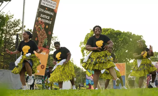 Dancers perform at a park near George Floyd Square on the five-year anniversary of Floyd's death, Sunday, May 25, 2025, in Minneapolis. (AP Photo/Abbie Parr)