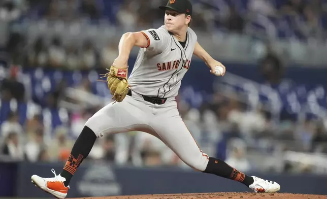 San Francisco Giants starting pitcher Kyle Harrison throws during the first inning of a baseball game against the Miami Marlins, Friday, May 30, 2025, in Miami. (AP Photo/Lynne Sladky)