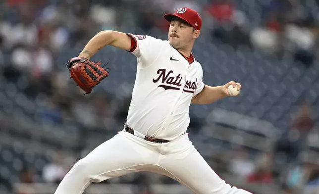 Washington Nationals pitcher Mitchell Parker throws during the second inning of a baseball game against the Atlanta Braves in Washington, Tuesday, May 20, 2025. (AP Photo/Terrance Williams)