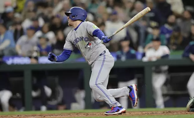 Toronto Blue Jays' Myles Straw hits a two RBI single against the Seattle Mariners during the eighth inning of a baseball game, Saturday, May 10, 2025, in Seattle. (AP Photo/John Froschauer)w