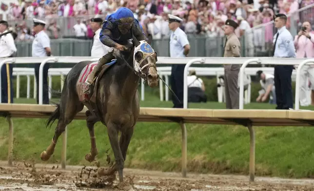 Good Cheer ridden by Luis Saez heads to victory in the 151st running of the Kentucky Oaks horse race at Churchill Downs Friday, May 2, 2025, in Louisville, Ky. (AP Photo/Jeff Roberson)