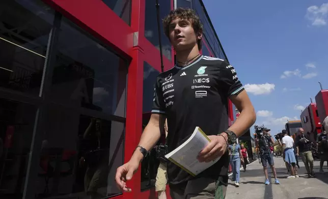 Mercedes driver Andrea Kimi Antonelli of Italy arrives for the first free practice at the Enzo and Dino Ferrari racetrack, ahead the Italy's Emilia Romagna Formula One Grand Prix, in Imola, Italy, Friday, May 16, 2025. (AP Photo/Antonio Calanni)