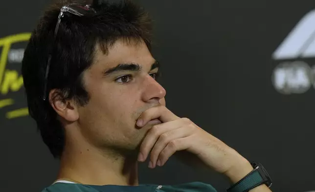 Aston Martin driver Lance Stroll of Canada answers reporters during a news conference at the Enzo and Dino Ferrari racetrack, ahead the Italy's Emilia Romagna Formula One Grand Prix in Imola, Italy, Thursday, May 15, 2025. (AP Photo/Luca Bruno)