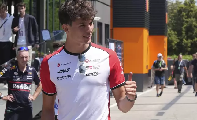 Haas driver Oliver Bearman of Britain arrives at the Dino and Enzo Ferrari racetrack, ahead the Italy's Emilia Romagna Formula One Grand Prix in Imola, Italy, Thursday, May 15, 2025. (AP Photo/Antonio Calanni)