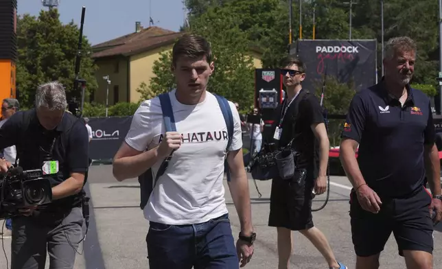 Red Bull driver Max Verstappen of the Netherlands arrives for the first free practice at the Enzo and Dino Ferrari racetrack, ahead the Italy's Emilia Romagna Formula One Grand Prix, in Imola, Italy, Friday, May 16, 2025. (AP Photo/Antonio Calanni)
