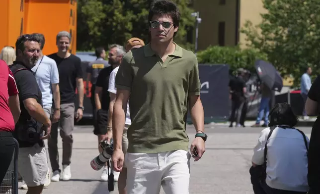 Aston Martin driver Lance Stroll of Canada arrives for the first free practice at the Enzo and Dino Ferrari racetrack, ahead the Italy's Emilia Romagna Formula One Grand Prix, in Imola, Italy, Friday, May 16, 2025. (AP Photo/Antonio Calanni)