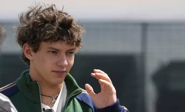 Mercedes driver Andrea Kimi Antonelli of Italy arrives prior to the first free practice at the Enzo and Dino Ferrari racetrack, ahead the Italy's Emilia Romagna Formula One Grand Prix, in Imola, Italy, Friday, May 16, 2025. (AP Photo/Luca Bruno)