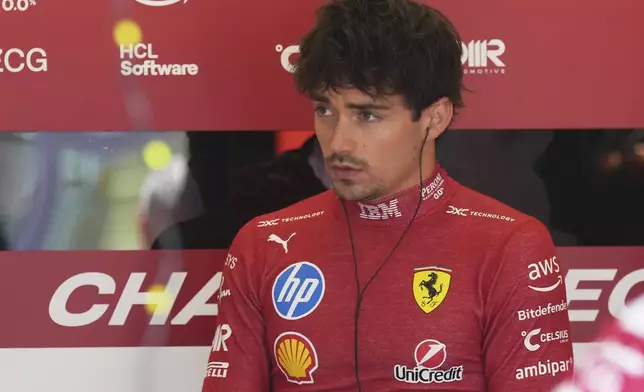 Ferrari driver Charles Leclerc of Monaco prepares for the first free practice at the Enzo and Dino Ferrari racetrack, ahead the Italy's Emilia Romagna Formula One Grand Prix, in Imola, Italy, Friday, May 16, 2025. (AP Photo/Antonio Calanni)