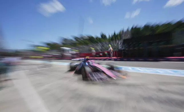 Alpine driver Franco Colapinto of Argentina enters the pitlane during the first free practice at the Enzo and Dino Ferrari racetrack, ahead the Italy's Emilia Romagna Formula One Grand Prix, in Imola, Italy, Friday, May 16, 2025. (AP Photo/Antonio Calanni)