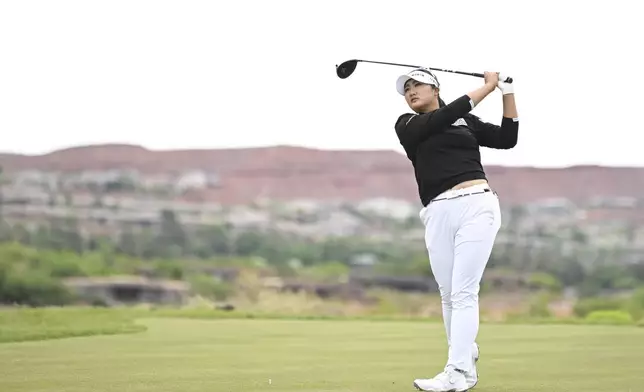 Haeran Ryu, of South Korea, hits from the ninth tee during the final round of the LPGA Black Desert Championship golf tournament Sunday, May 4, 2025, in Ivins, Utah. (AP Photo/Candice Ward)