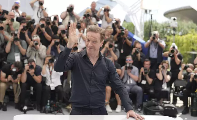 Damian Lewis poses for photographers at the photo call for the film 'Orwell: 2+2 = 5' at the 78th international film festival, Cannes, southern France, Sunday, May 18, 2025. (AP Photo/Natacha Pisarenko)