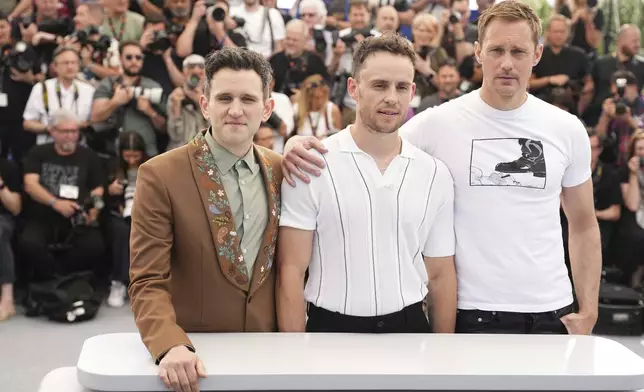 Harry Melling, from left, director Harry Lighton and Alexander Skarsgard pose for photographers at the photo call for the film 'Pillion' at the 78th international film festival, Cannes, southern France, Sunday, May 18, 2025. (Photo by Scott A Garfitt/Invision/AP)