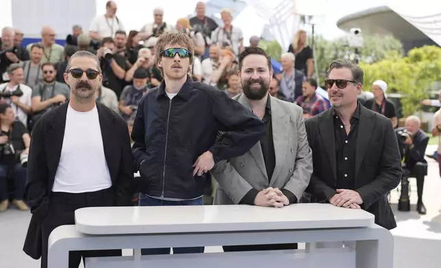 Shia LaBeouf, from left, director Leo Lewis O'Neil, producer Matt Zien and producer Kevin Knight pose for photographers at the photo call for the film 'Slauson Rec' at the 78th international film festival, Cannes, southern France, Sunday, May 18, 2025. (AP Photo/Natacha Pisarenko)