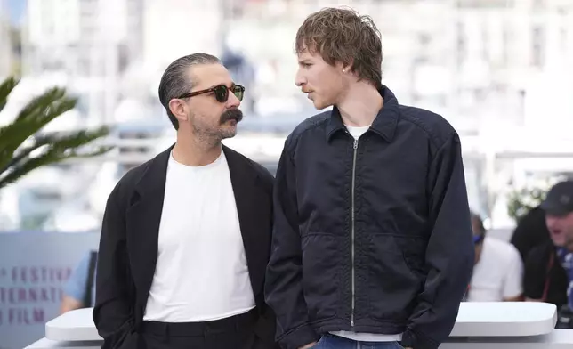Shia LaBeouf, left, and director Leo Lewis O'Neil pose for photographers at the photo call for the film 'Slauson Rec' at the 78th international film festival, Cannes, southern France, Sunday, May 18, 2025. (Photo by Lewis Joly/Invision/AP)