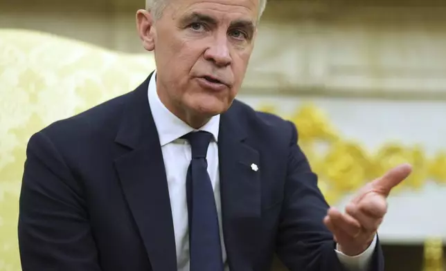 Canadian Prime Minister Mark Carney speaks during a meeting with President Donald Trump in the Oval Office of the White House, Tuesday, May 6, 2025, in Washington. (AP Photo/Evan Vucci)