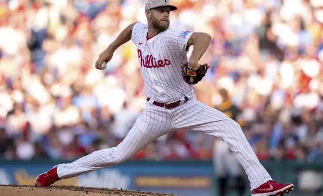 Philadelphia Phillies starting pitcher Zack Wheeler delivers during the third inning of a baseball game against the Pittsburgh Pirates, Saturday, May 17, 2025, in Philadelphia. (AP Photo/Chris Szagola)