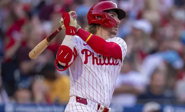 Philadelphia Phillies' Bryson Stott hits a home run during the third inning of a baseball game against the Pittsburgh Pirates, Saturday, May 17, 2025, in Philadelphia. (AP Photo/Chris Szagola)