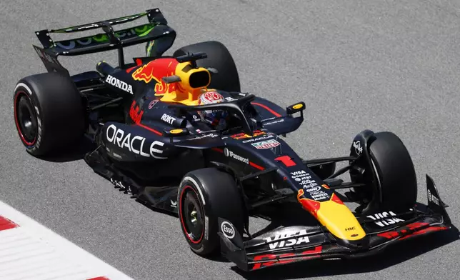 Red Bull driver Max Verstappen of the Netherlands steers his car during the first free practice ahead of the Spanish Grand Prix Formula One race at the Barcelona Catalunya racetrack in Montmelo, near Barcelona, Spain, Friday, May 30, 2025. (AP Photo/Joan Monfort)