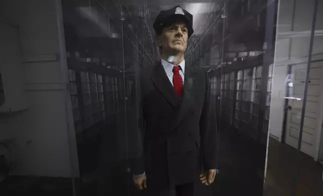 A mannequin is dressed as a prison guard as visitors tour the former Alcatraz Federal Penitentiary on Alcatraz Island in San Francisco Bay, Ca., Monday, May 5, 2025. (AP Photo/Jed Jacobsohn)