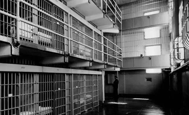 FILE - One of three cell tiers of individual cells at the main block of the Alcatraz Federal Prison on Alcatraz Island in San Francisco Bay, California, March 15, 1956. (AP Photo)
