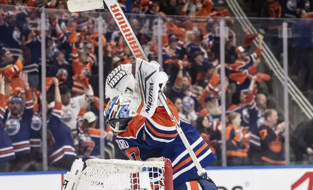 Edmonton Oilers goalie Calvin Pickard (30) celebrates the win over the Los Angeles Kings during NHL playoff action in Edmonton on Thursday, May 1, 2025. (Jason Franson/The Canadian Press via AP)