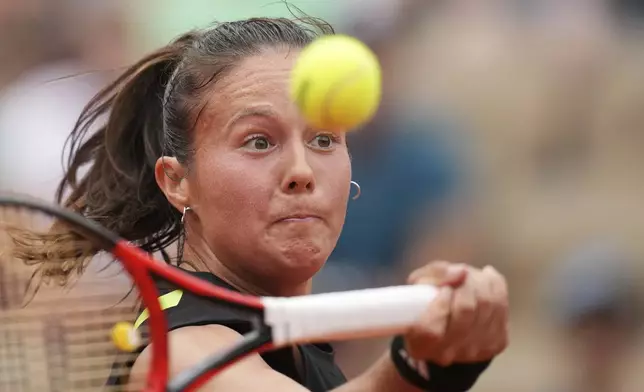 Australia's Daria Kasatkina returns the ball to Spain's Paula Badosa during their third round match of the French Tennis Open, at the Roland-Garros stadium, in Paris, Saturday, May 31, 2025. (AP Photo/Christophe Ena)