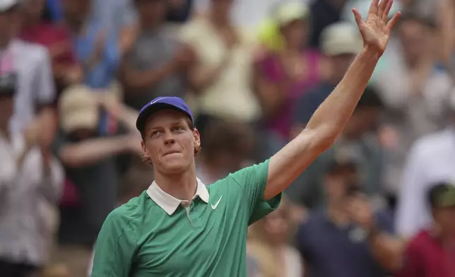 Italy's Jannik Sinner celebrates after beating Jiri Lehecka of the Czech Republic during their third round match of the French Tennis Open, at the Roland-Garros stadium, in Paris, Saturday, May 31, 2025. (AP Photo/Thibault Camus)