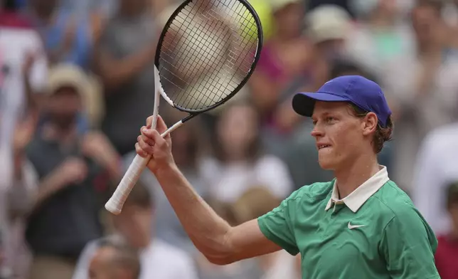 Italy's Jannik Sinner celebrates after beating Jiri Lehecka of the Czech Republic during their third round match of the French Tennis Open, at the Roland-Garros stadium, in Paris, Saturday, May 31, 2025. (AP Photo/Thibault Camus)