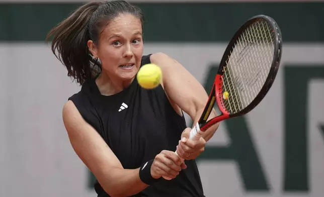Australia's Daria Kasatkina returns the ball to Spain's Paula Badosa during their third round match of the French Tennis Open, at the Roland-Garros stadium, in Paris, Saturday, May 31, 2025. (AP Photo/Christophe Ena)
