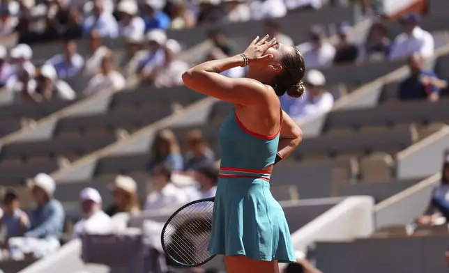 Aryna Sabalenka of Belarus reacts as she plays Serbia's Olga Danilovic during their third round match of the French Tennis Open, at the Roland-Garros stadium, in Paris, Friday, May 30, 2025. (AP Photo/Lindsey Wasson)