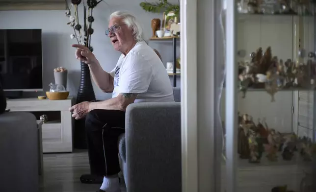 Ben Buitenhuis, a 83-year-old surivor of the 1944-1945 Hunger Winter, reacts during an interview in Delft, Netherlands, Tuesday, April 29, 2025. (AP Photo/Peter Dejong)
