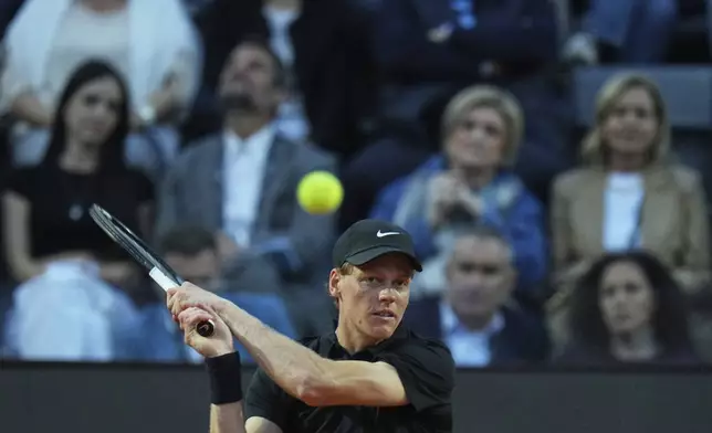 Italy's Jannik Sinner eyes the ball during a second round match against Argentina's Mariano Navone at the Italian Open tennis tournament in Rome, Saturday, May 10, 2025. (AP Photo/Andrew Medichini)