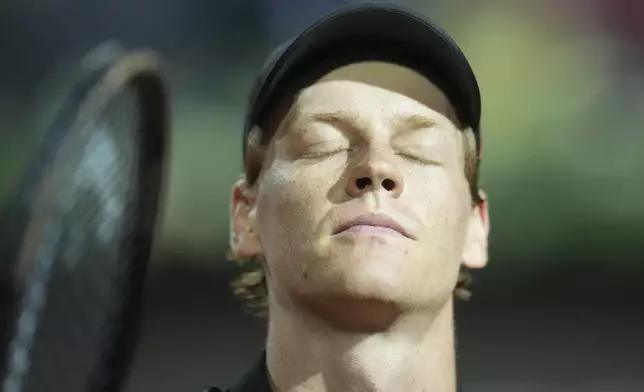 Italy's Jannik Sinner reacts after a second round match against Argentina's Mariano Navone at the Italian Open tennis tournament in Rome, Saturday, May 10, 2025. (AP Photo/Andrew Medichini)
