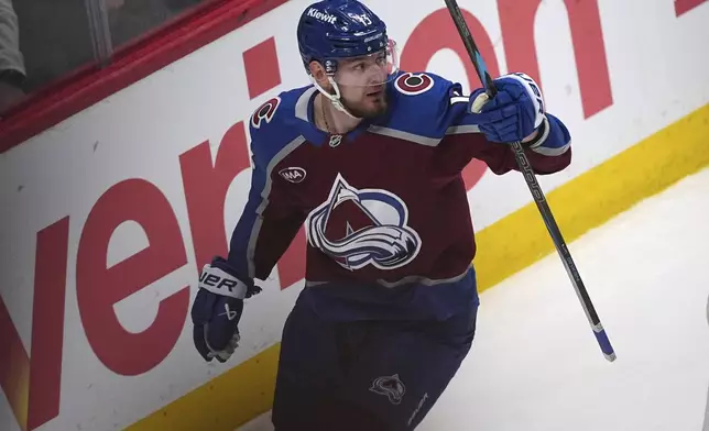 Colorado Avalanche right wing Valeri Nichushkin reacts after scoring against the Dallas Stars in the first period of Game 6 of an NHL hockey first-round playoff series Thursday, May 1, 2025, in Denver. (AP Photo/David Zalubowski)
