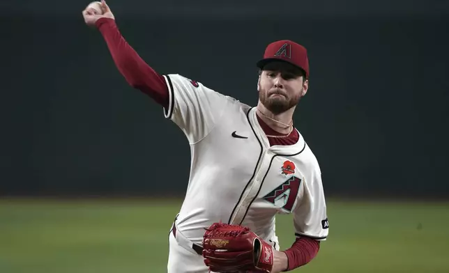 Arizona Diamondbacks pitcher Ryne Nelson throws against the Pittsburgh Pirates in the first inning during a baseball game, Monday, May 26, 2025, in Phoenix. (AP Photo/Rick Scuteri)